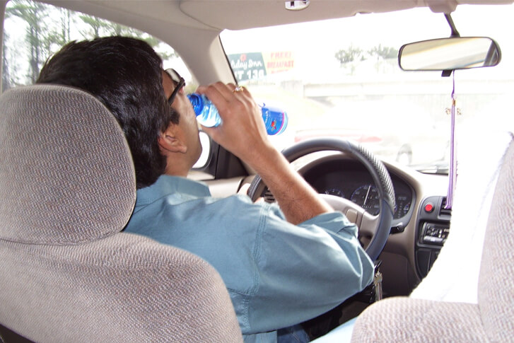 Drinking water behind the wheel